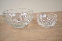 A Waterford cut crystal bowl, w14.5cm, sold together with a similar bowl, (2)