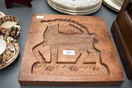 A 20th century wooden biscuit mould depicting a spring box animal figure, w29cm