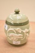 A James Macintyre & Co limited Washington Faience jar with cover