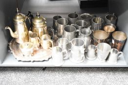 A silver plated tea service comprising of tea pot, coffee pot, cream jug, sugar bowl and tray,