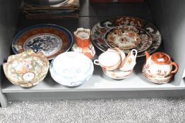 A 20th century Japanese 'Satsuma' pattern tea service, (11), sold together with a Royal Terra