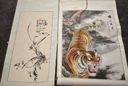 A Chinese scroll depicting a tiger by a waterfall, signed upper right, L123cm, sold together with