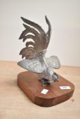 An ornamental plated fighting cock on wooden plinth, overall height approx. 26cm