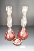 A pair of cranberry to clear glass vases of waisted form, h25.5cm