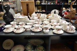 A Royal Albert 'Lavender Rose' pattern dinner service, to include coffee cups, tea cups, sauce boat,