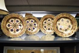 A group of four Victorian Crown Derby Porcelain 1691 Imari pattern plates, of slightly shaped
