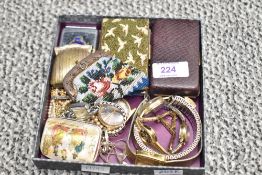 A small selection of costume jewellery including a silver necklace, wristwatches and faux pearls,