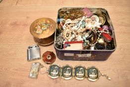 An assortment of costume jewellery, including shell jewellery, brooches, loose stones including