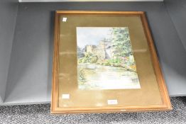 An early 20th century English School watercolour, manor house with pond, unsigned, within a gilt