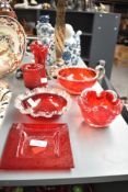 A ruby red glass basket vase having shaped handles, w20cm, sold together with various studio glass (