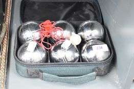 A Petanque Or Boules steel ball set with case