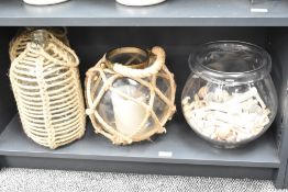 A pair of glass carboys bound in rope, h35cm, sold together with 2 similar carboys, (4)