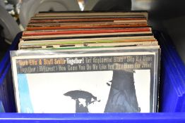 A selection of vinyl LP records, mainly Jazz albums including Oscar Peterson , Herb Ellis, Duke