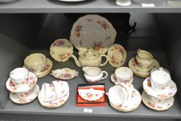 A Royal Crown 'Derby Posies' pattern tea set decorated with gilt edging and floral patterns