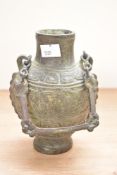 A Chinese style metal jar having chain handle, h17cm