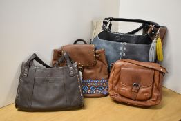 Four ladies leather handbags to include Radley London in textured grain dark chocolate brown with