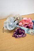 Four mid-century cloth flowers in pink gradient satin, purple gradient velvet, baby blue georgette