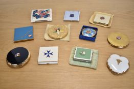 Collection of twelve vintage compact bearing various Military, Shipping, Royal and/or Commercial