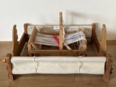 Two vintage Dryad heddle looms, one measuring 10.5 x 16.5 x 11 inches, the other 25 x 19 x 10.5