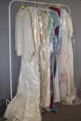 Assorted 20th century dresses and costume in pastel, cream and ivory shades, includes Ronald
