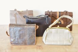 Five leather bags comprising three frame structured handbags, a cocoa brown Waldybag, a taupe Made