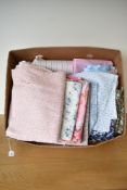Assorted vintage and later cotton fabrics in floral, plaid, striped and spotted patterns, a mix of