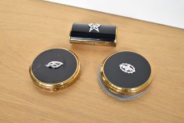 Three vintage compacts and a perfume vial, featuring Marcasite decoration with black lacquer on gilt