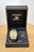 A vintage Seiko SQ Quartz 4004 gold-tone and stainless steel wrist watch, Ref. 4633-5019, Serial No.