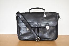 A Rowallan briefcase in black smooth leather, measures 17 x 12 x 2.5 inches.