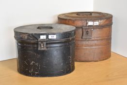 Two antique metal hat boxes, a black coated measuring 9 x 9 x 13 imches, and a brown painted
