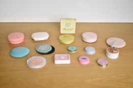 A collection of fourteen mid-century vintage and later make-up compacts and containers, unused (