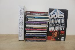 A Zappa CD collection with some VHS in the same lot