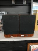 A Q-Acoustics pair of Book Shelf speakers in wooden cases - highly regarded audio - superb items