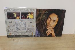 A Bob Marley and The Wailers ' Babylon by Bus double set - VG/VG+ with a copy of ' Legend ' in