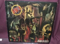 A Slayer ' Reign In Blood - UK Def Jam original press VG/VG with one feelable scratch - rare despite