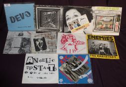 A job lot of ten Punk Rock 45's - some amazing music on offer from Devo , X-Ray Spex . SLF and more