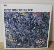 A Stone Roses ' very best of ' 2LP set - comes with inners -EX vinyl - small stain bottom right of