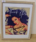 A lot of two , what appear to be signed Diana Ross framed and mounted prints the largest measuring -
