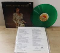 A rare afrobeat / disco record from Christy Esssien - green vinyl - sleeve only VG