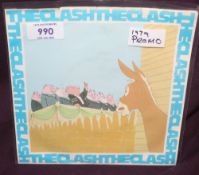 A Clash ' English Civil War ' 45 - UK Promo with some writing on label and sleeve wear to top