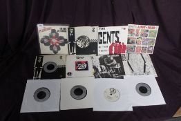A job lot of twelve Mod / Ska and related 45's - Specials , Gents , Pleasers and more