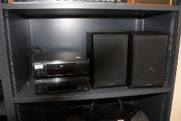 A Denon System DCDF107 CD player with speakers and Tuner