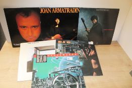 A 14 Album lot with Joan Armatrading , Dire Straits and more on offer here - condition is VG or