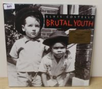 An Elvis Costello ' Brutal Youth ' limited edition numbered red vinyl press 000515 - NM/NM