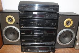 A Pioneer Stack System with turntable and speakers - has double cassette with it