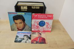 An Elvis Presley collection - 33 in total with box
