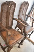 A pair of late 19th or early 20th Century oak carver chairs having bergere cane backs