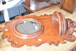 A Victorian hall mirror having shaped frame and shelf under, width approx. 46cm