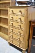 A modern pine six drawer bedroom chest, dimensions approx. H115, W66, D40cm