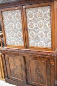 A Victorian and later bookcase (possible marriage), width approx. 123cm